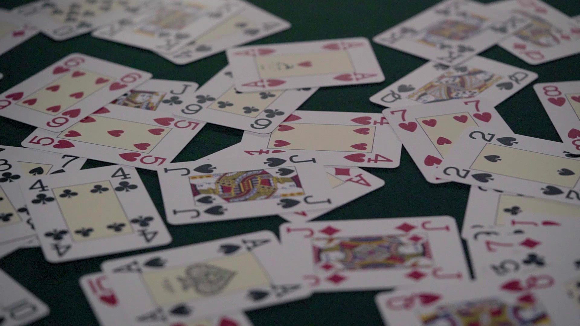 video with a lot of card on club's carpet and poker tables 